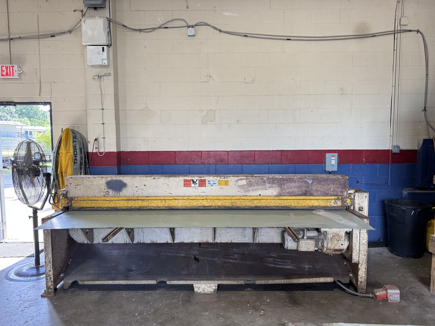 Shearing sheet to size before it goes on the brake